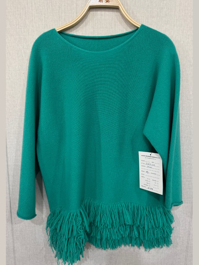 Jade green pullover with fringe hem, style DS26-PX-23019, from the Knitwear World sample collection
