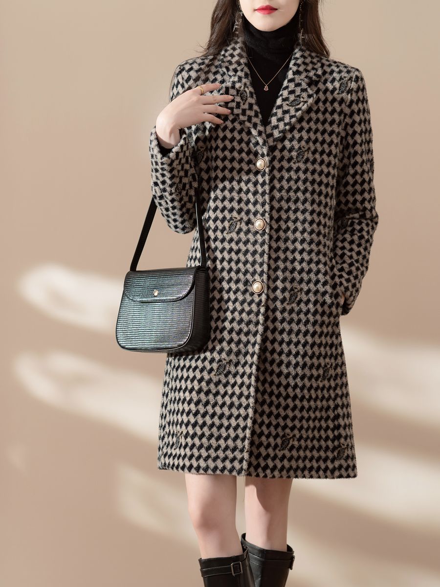 Women's knit coat in black and white houndstooth, made by Knitwear World