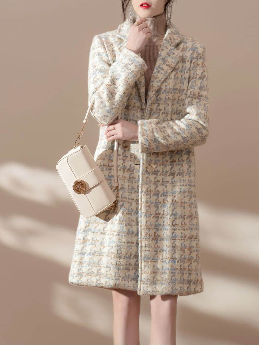 Women's knit coat in cream houndstooth, made by Knitwear World