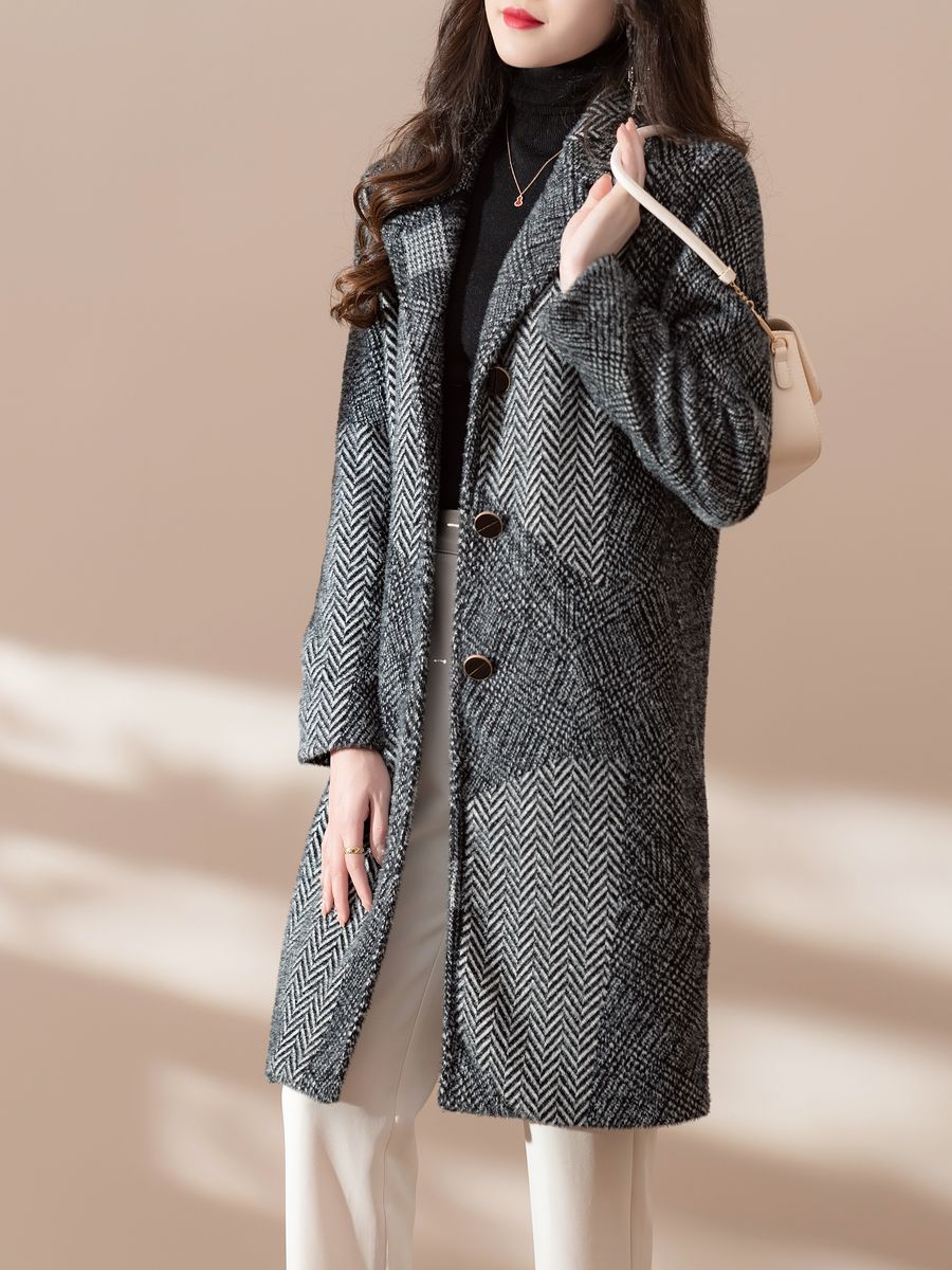 Women's knit coat in grey herringbone patchwork, made by Knitwear World