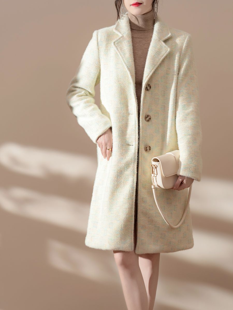 Women's knit coat in ivory, made by Knitwear World