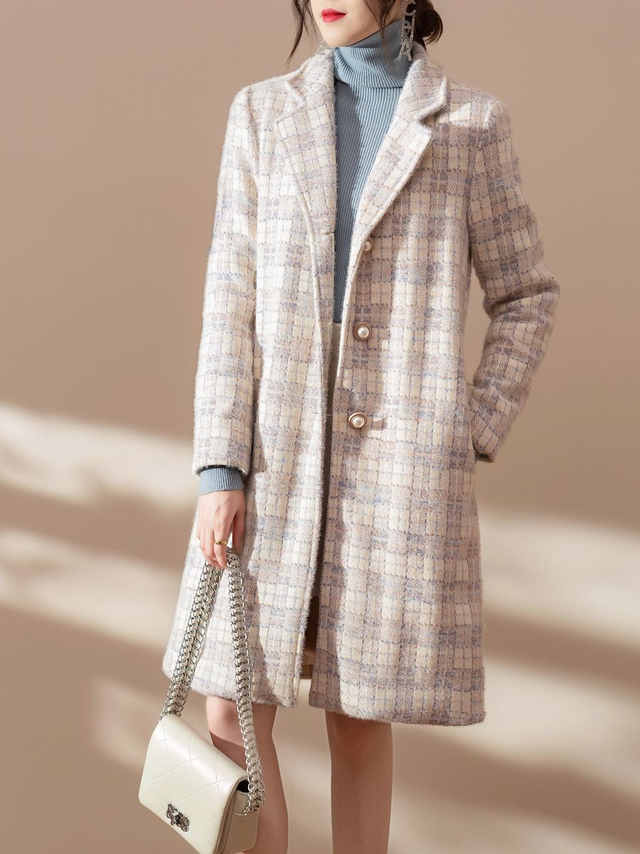 Women's knit coat in pastel plaid, made by Knitwear World