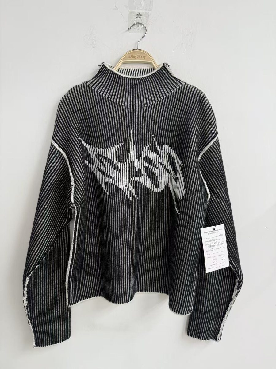 Men's black rib mock-neck pullover with graphic jacquard, style DS27-K1064, from the Knitwear World sample collection