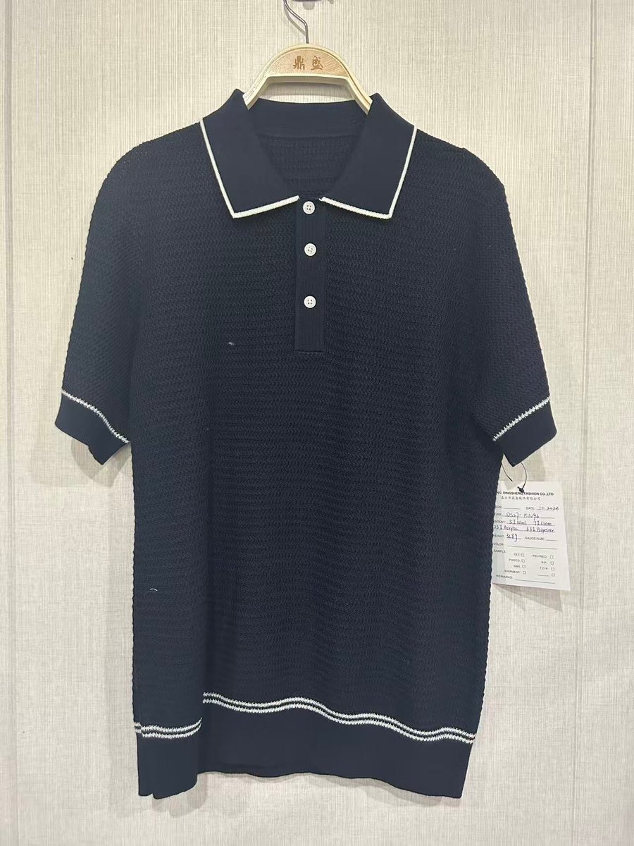 Men's navy short-sleeve knit polo with white tipping, style DS27-K1096, from the Knitwear World sample collection