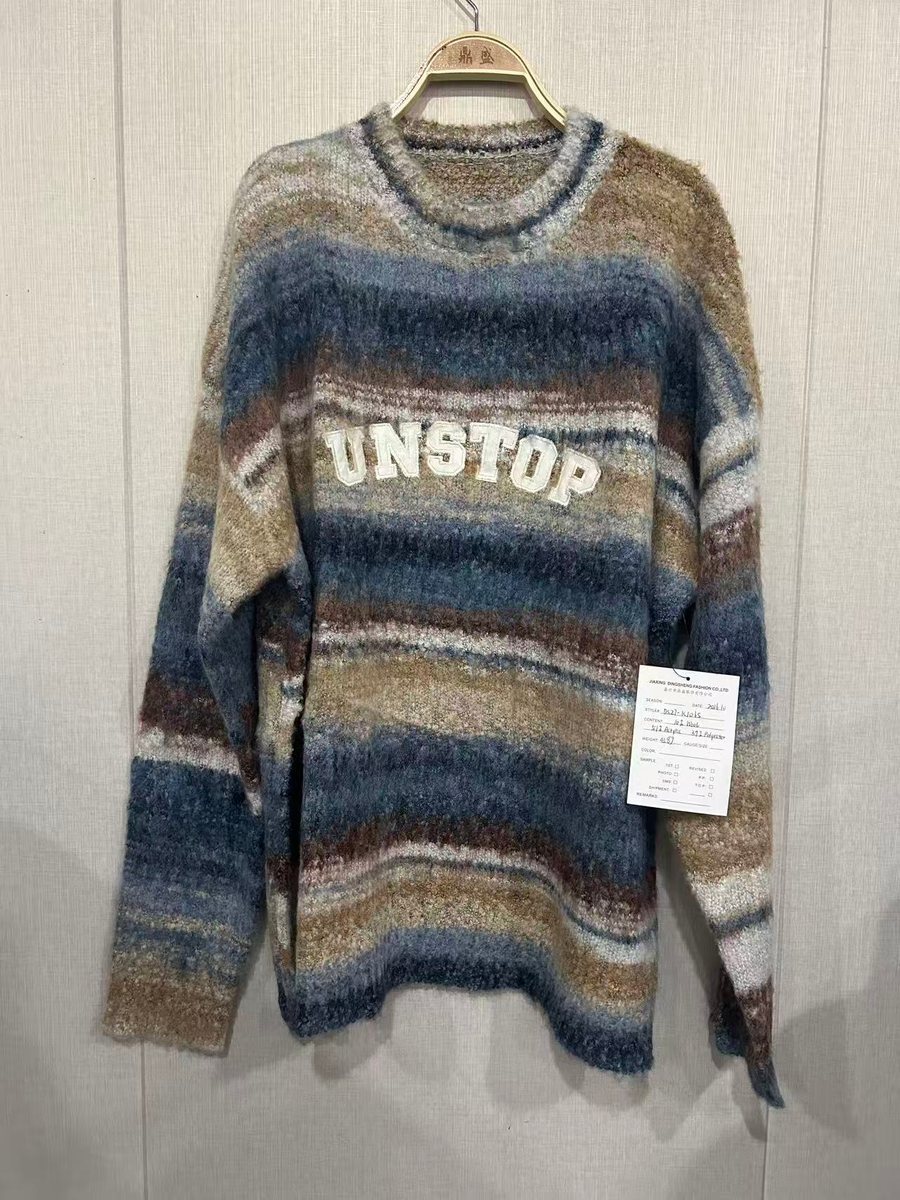 Men's space-dye stripe pullover with slogan lettering, style DS27-K1065, from the Knitwear World sample collection