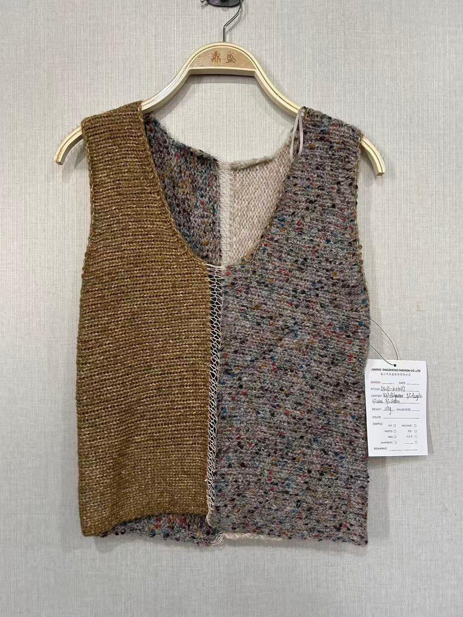 Mustard and multicolour tweed-yarn asymmetric vest, style DS27-K04077, from the Knitwear World sample collection