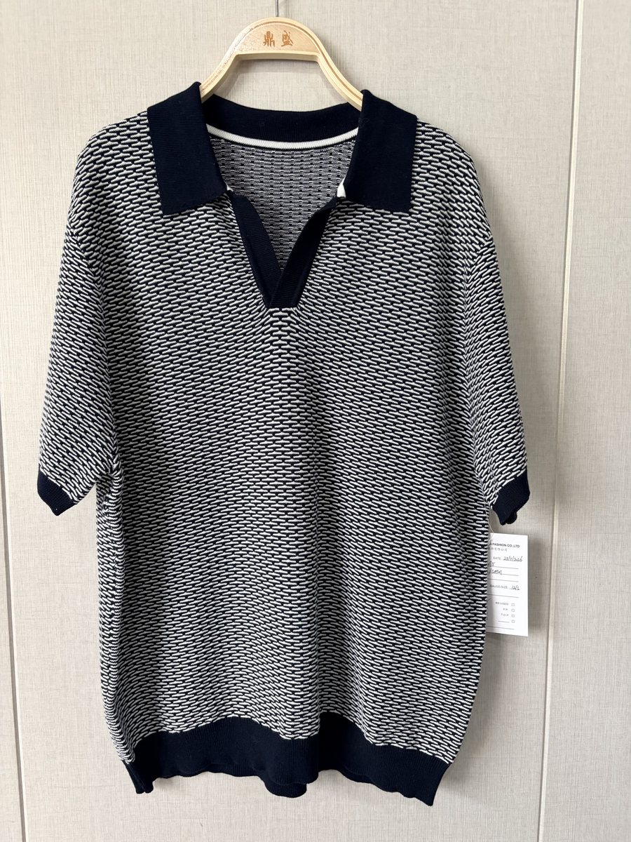 Men's navy and white textured polo with contrast collar, style DS26-05095, from the Knitwear World sample collection