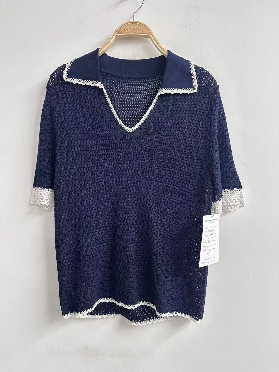 Navy short-sleeve knit polo with lace trim, style DS27-K04051, from the Knitwear World sample collection