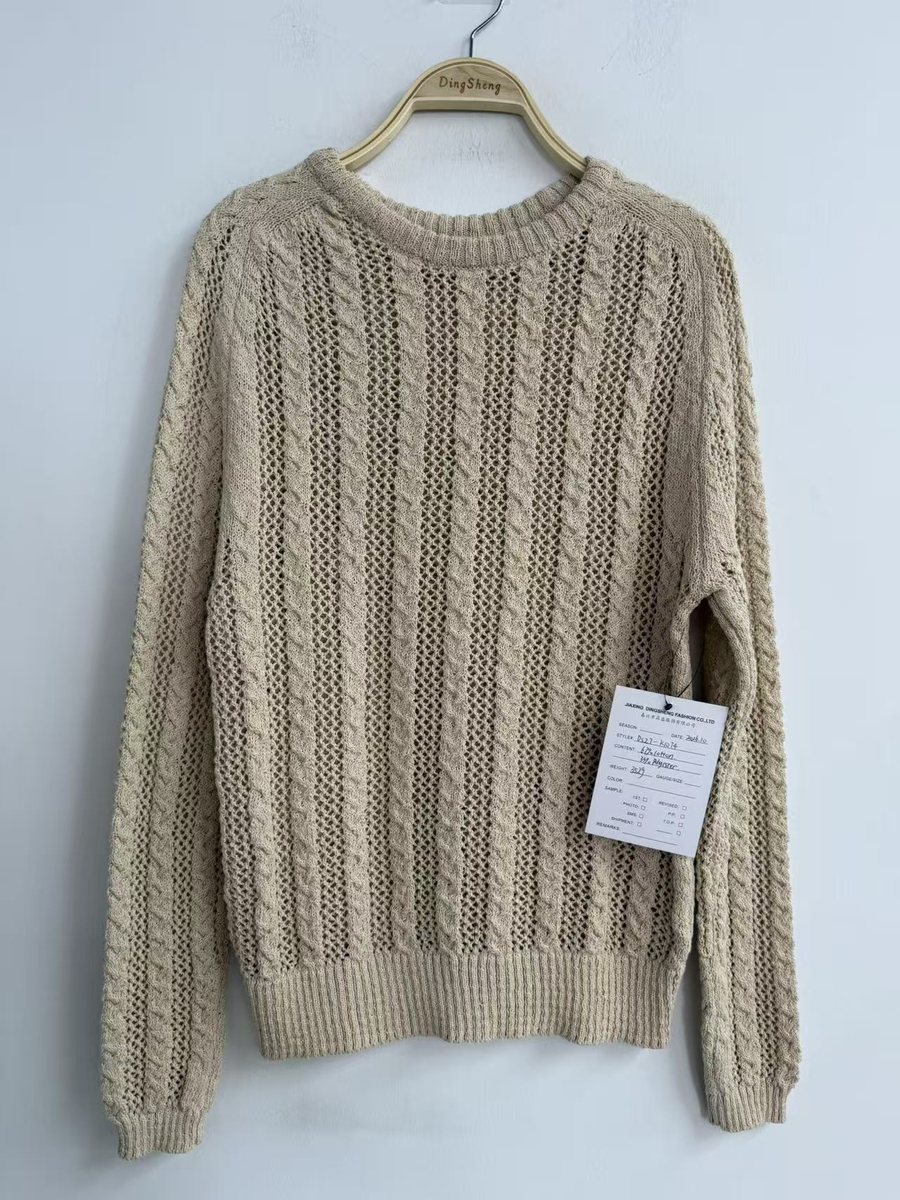 Oatmeal cable and pointelle crew-neck pullover, style DS27-K1074, from the Knitwear World sample collection