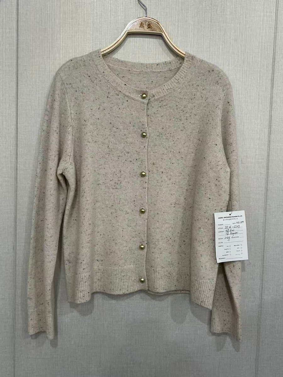 Oatmeal flecked crew-neck cardigan with gold buttons, style DS25-CT019, from the Knitwear World sample collection
