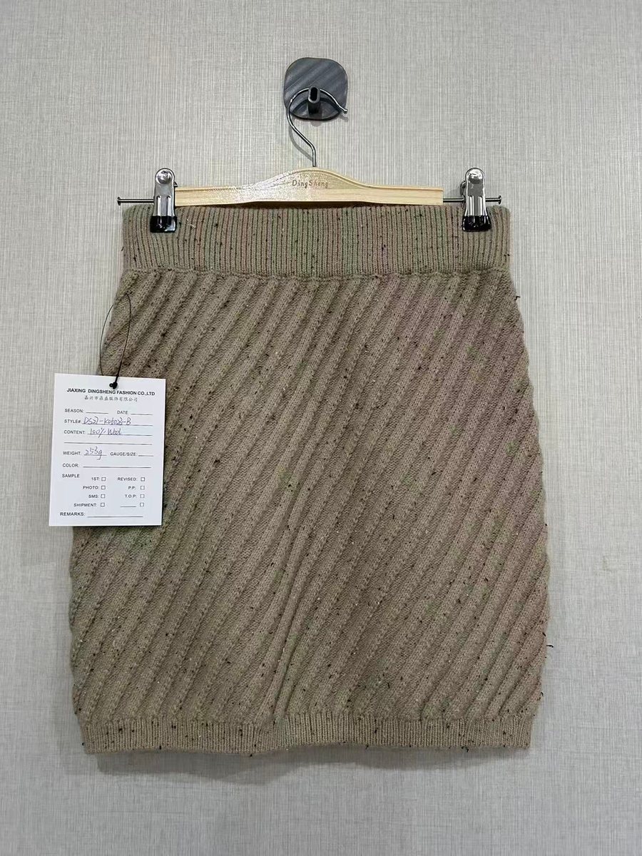 Olive diagonal-rib knit mini skirt, style DS27-K06023-B, from the Knitwear World sample collection