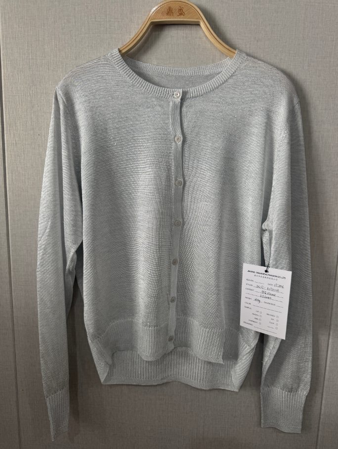 Pale grey lurex crew-neck cardigan, style DS27-K07003, from the Knitwear World sample collection