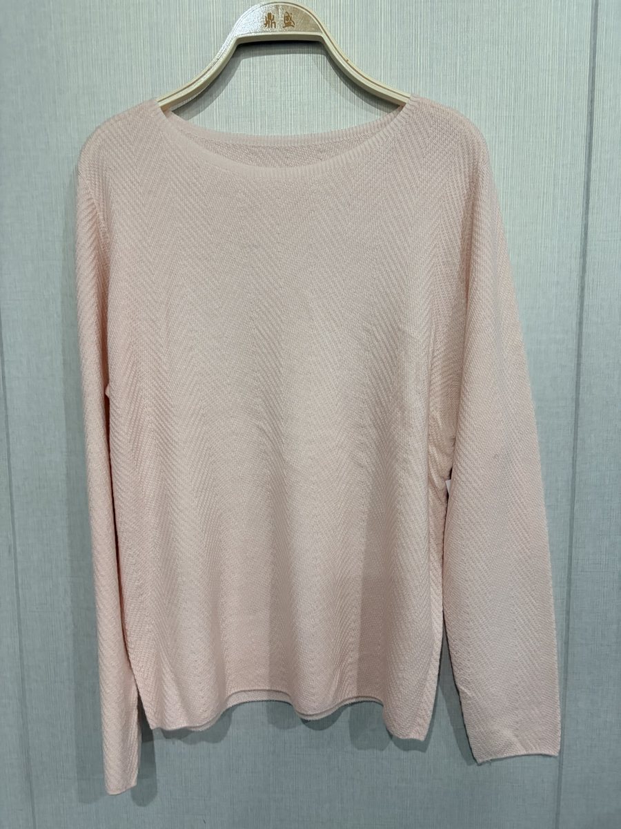 Pale pink herringbone-knit pullover, style DS27-B07021-YS, from the Knitwear World sample collection