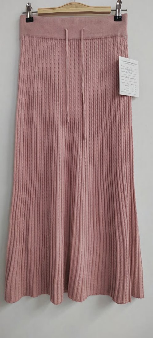 Pink pleated rib midi skirt, style DS26-08004, from the Knitwear World sample collection