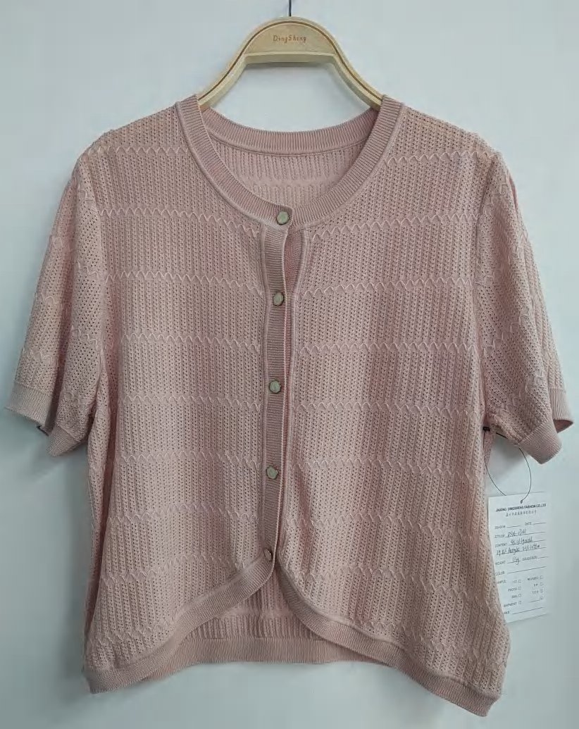 Pink pointelle short-sleeve cardigan, style DS26-07041, from the Knitwear World sample collection