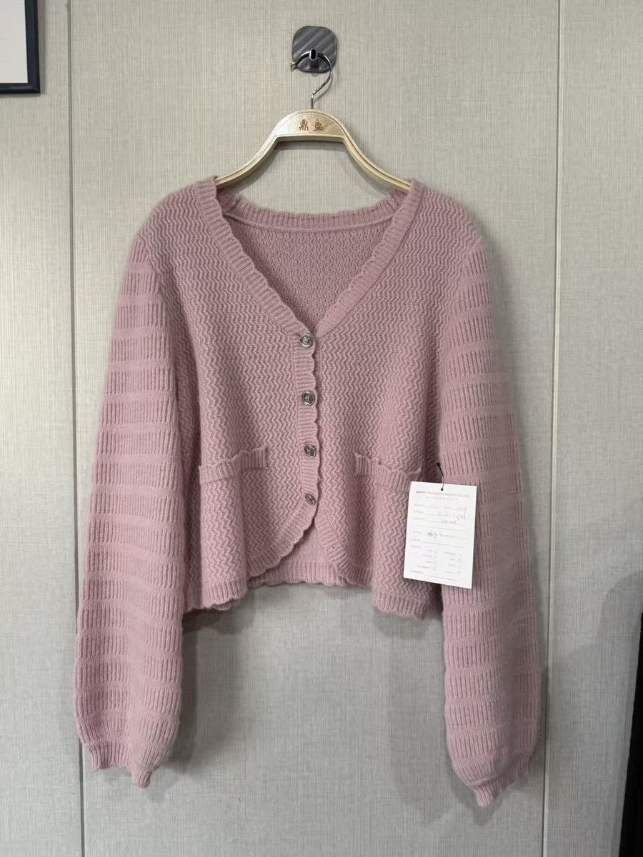 Pink V-neck cropped cardigan with scalloped edges, style DS26-K09001, from the Knitwear World sample collection