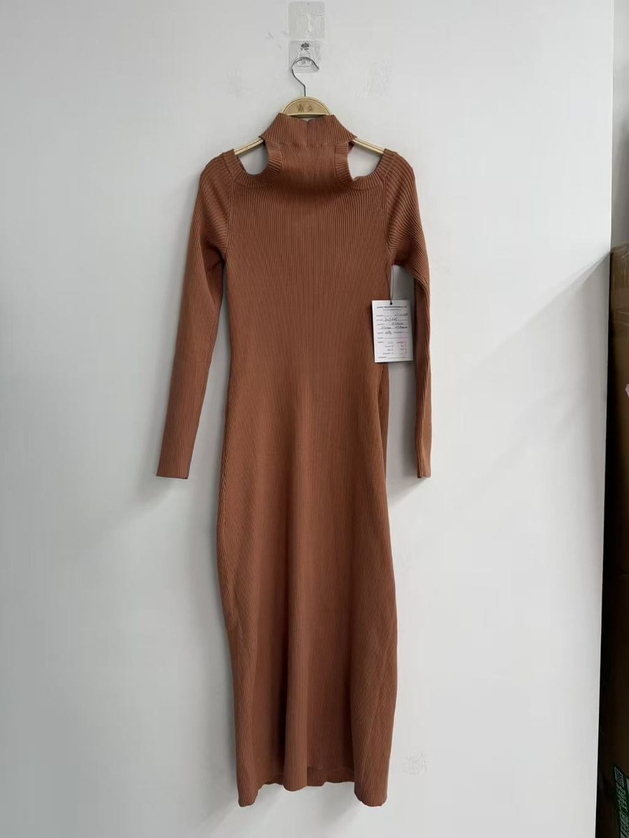 Rust rib turtleneck midi dress with cut-out shoulders, style DS27-K1005, from the Knitwear World sample collection