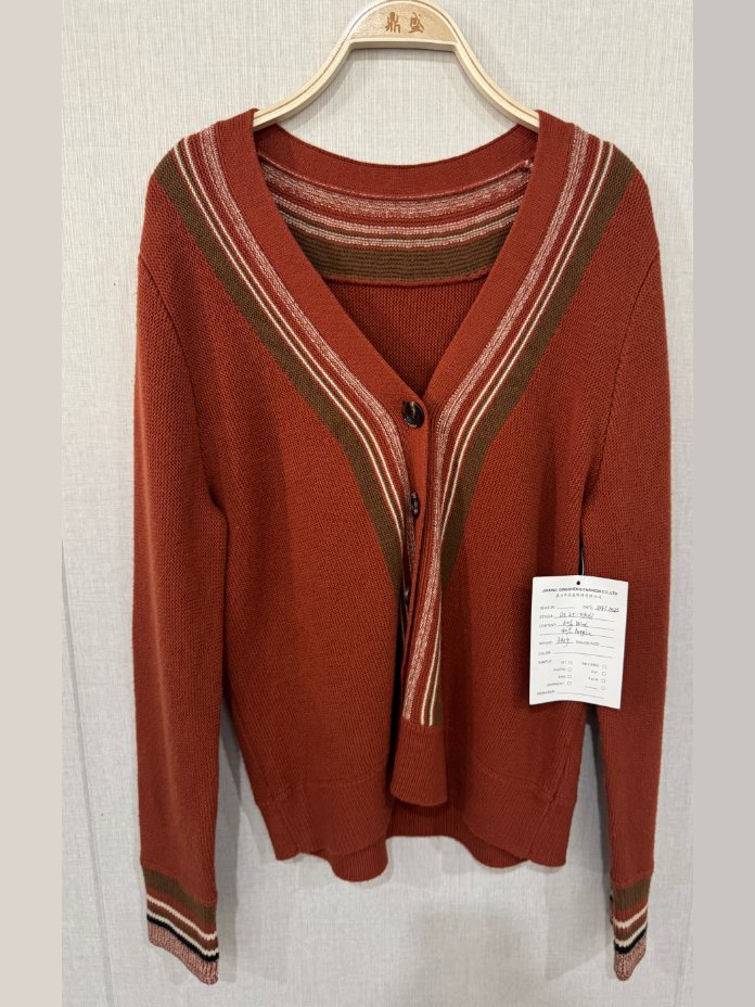 Rust V-neck cardigan with striped trims, style DS25-03061, from the Knitwear World sample collection