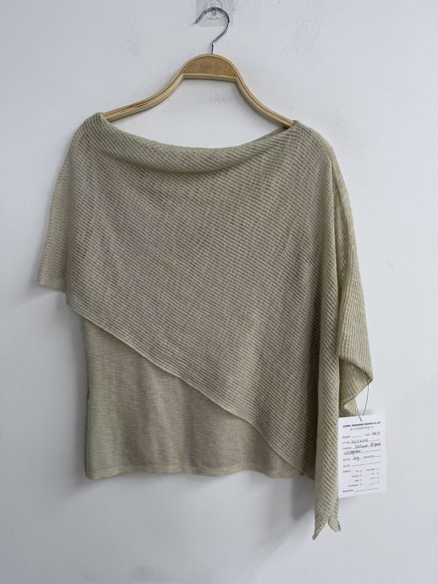 Sage asymmetric drape-neck knit top, style DS27-K1043, from the Knitwear World sample collection