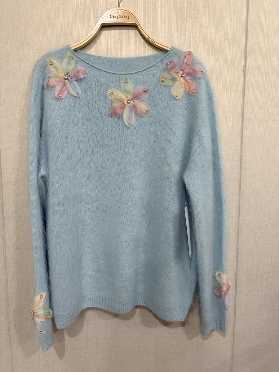 Sky blue brushed pullover with organza flower appliqués, style DS27-B07006, from the Knitwear World sample collection