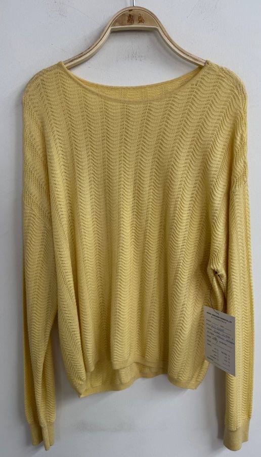 Yellow pointelle pullover, style DS27-K06001, from the Knitwear World sample collection